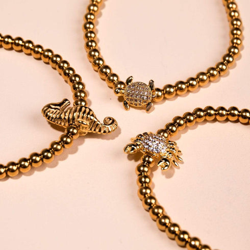 Récif | Or 18 carats | Bracelet à breloques hippocampe